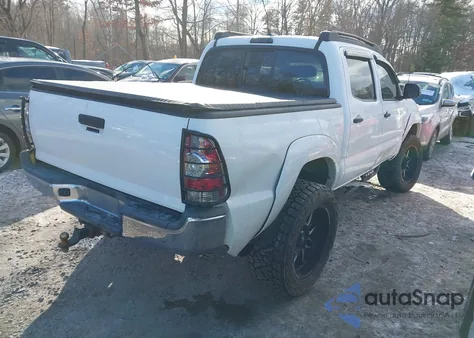 2015 Toyota Tacoma Base V6 z USA, uszkodzony, nr VIN 3TMLU4EN5FM172706